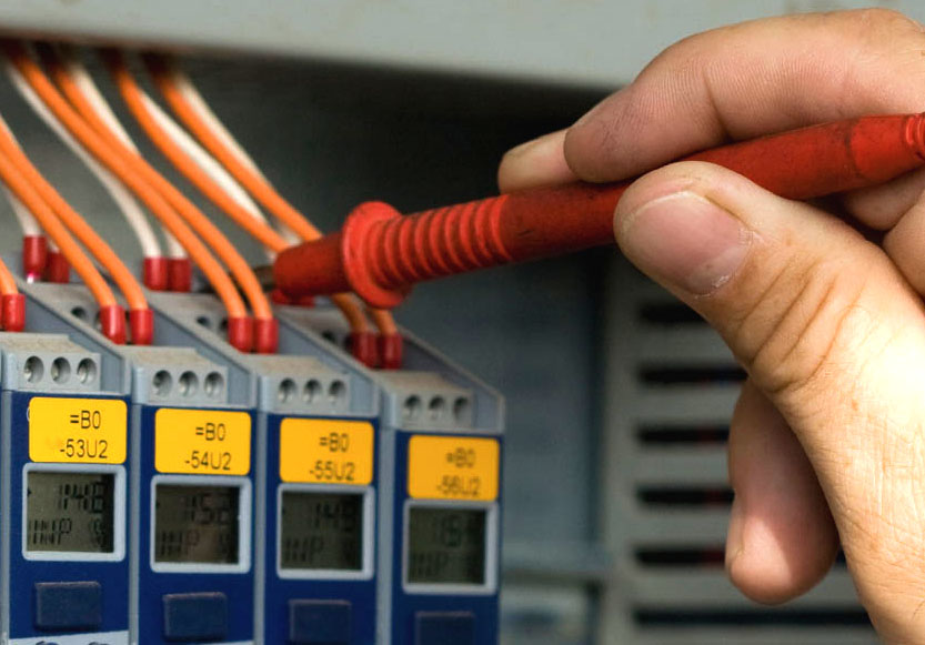 Commercial electrical worker testing circuits